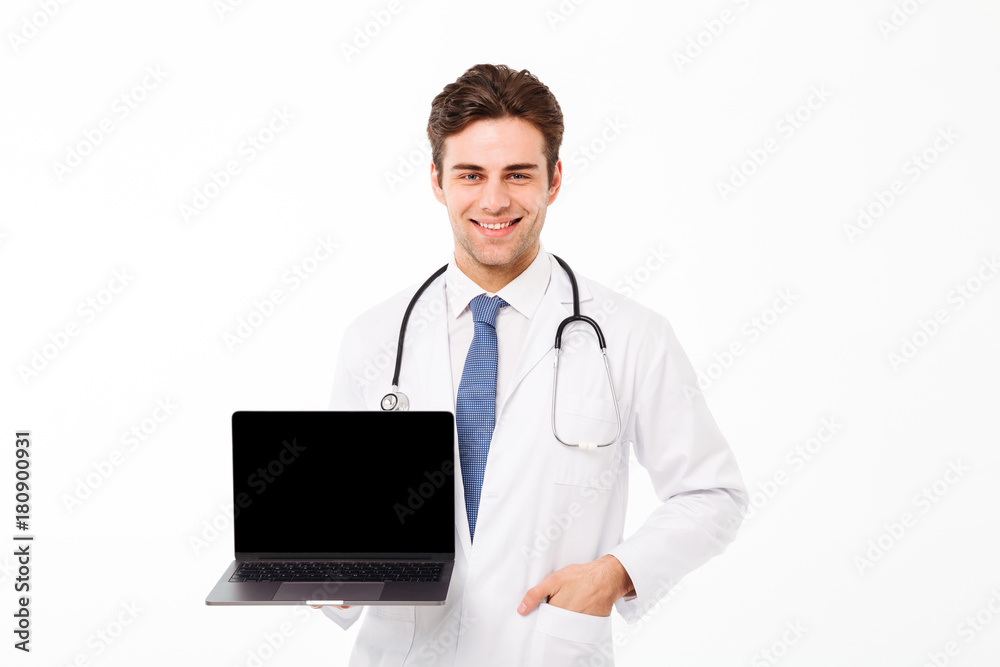 Portrait of a smiling young male doctor with stethoscope Portrait of a smiling young male doctor with stethoscope