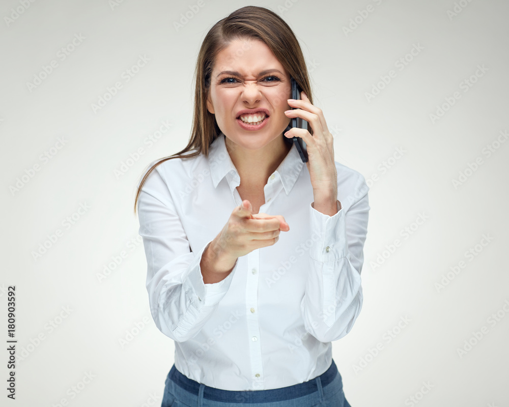 Angry Boss businesswoman emotional shouting with mobile phone. Angry Boss businesswoman emotional shouting with mobile phone.