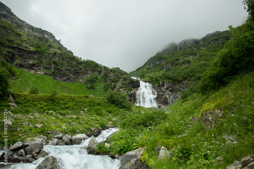 Fototapeta premium Beautiful mountain waterfall in the South
