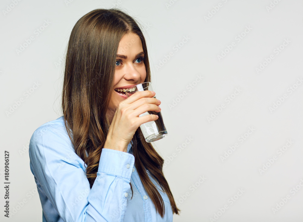 Portrait of young woman drinking water from glass Portrait of young woman drinking water from glass