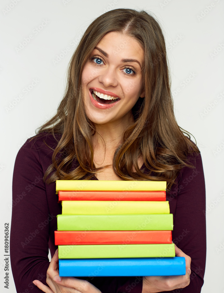 Close up portrait of student girl with books pile. Close up portrait of student girl with books pile.
