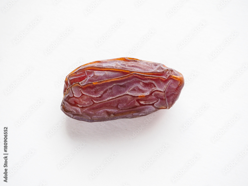 Delicious fresh organic dates over white background
Delicious fresh organic dates over white background