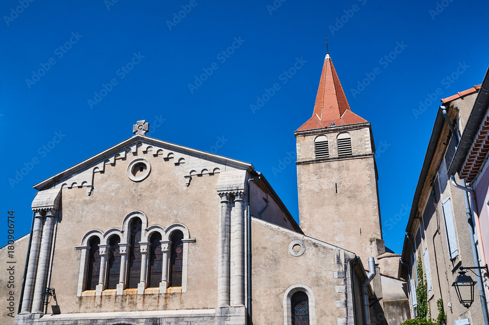 The facade of a medieval church in Villeneuve-de-Berg, France.