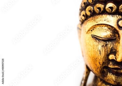 Photography head of golden buddha statue on white background