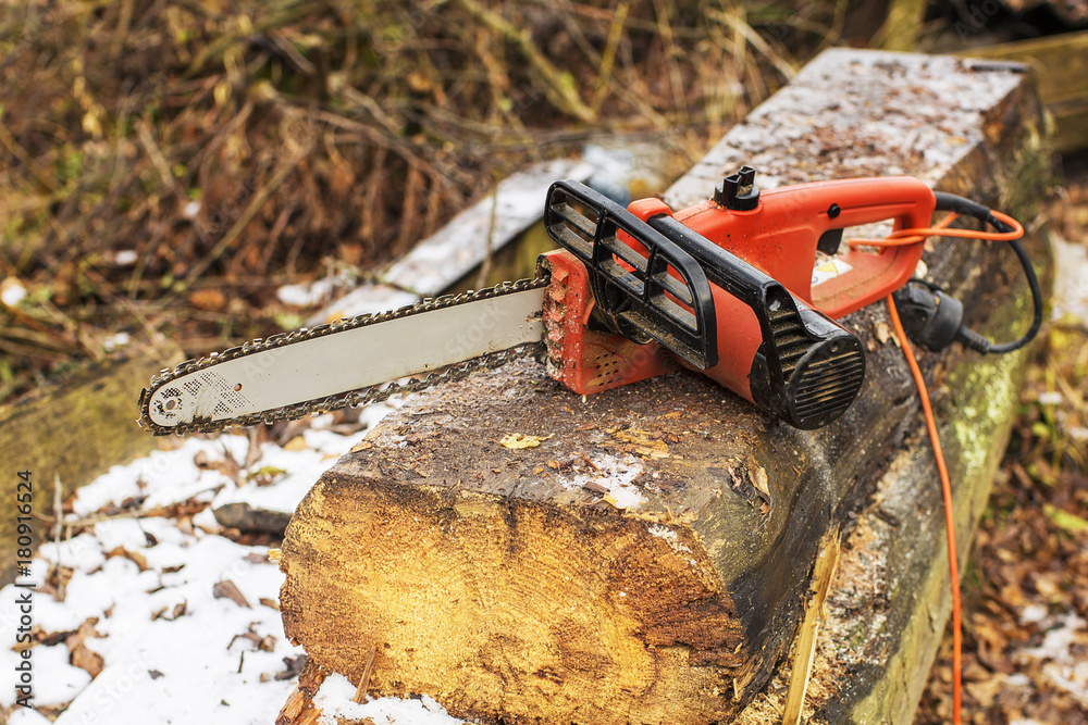 A saw on a log