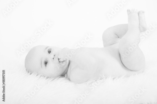 astonished six month old baby boy photo