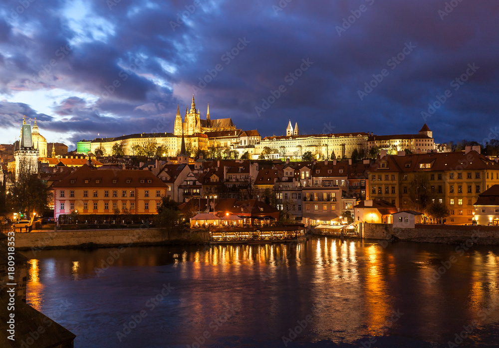 Prague, Czech Republic - Night view of the city. Mala Strana neighborhood, with the Castle and the Cathedral of Prague, entitled to Saint Vitus.