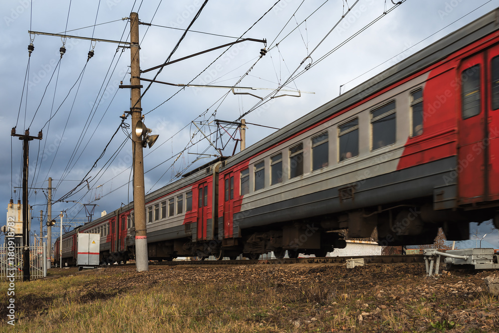 Obraz premium Passenger train rides along the route