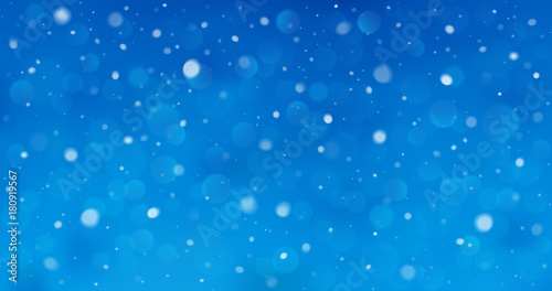 blue winter background with snowflakes and bokeh lights