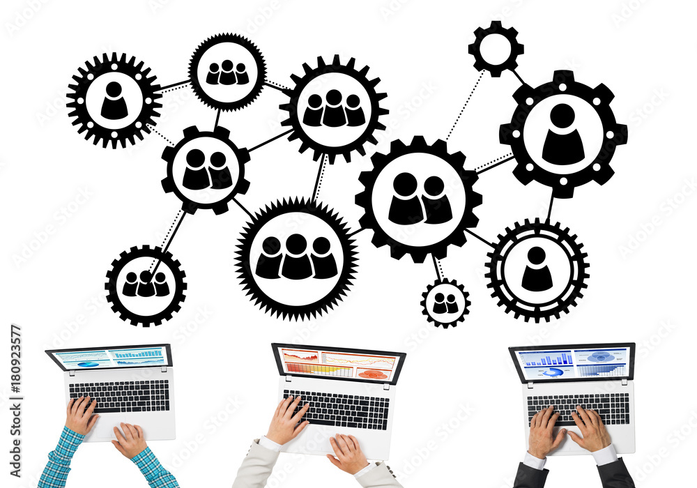 Top view of businesspeople sitting at table and using gadgets Top view of businesspeople sitting at table and using gadgets
