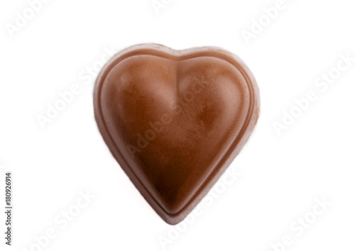 Heart shaped chocolate candy isolated on white background