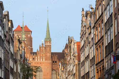 View of St. Mary's Church and old buildings on the St. Mary's Street (ul. Mariacka) at the Main Town (Old Town) in Gdansk, Poland, in the morning.
