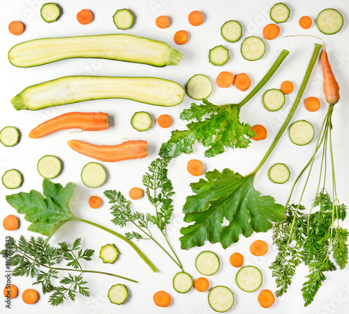 Fototapeta Naklejka Na Ścianę i Meble -  Vegetables pattern of fresh vegetables on white background. Carrots, zucchini.