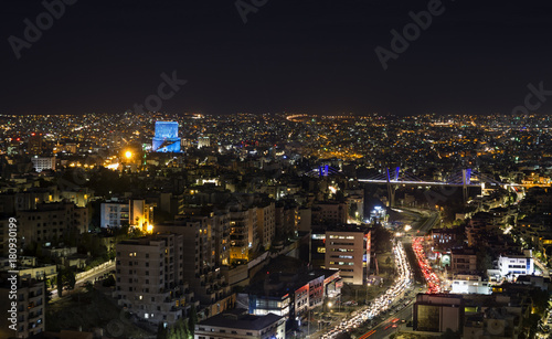 Abdoun bridge and Amman mountains at night
