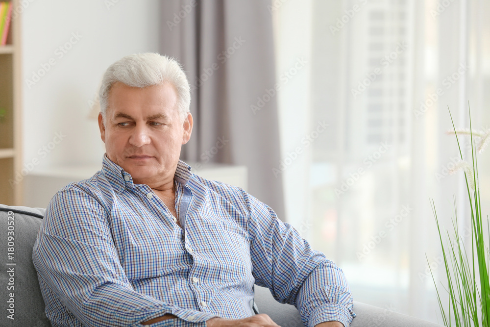 Handsome mature man at home Handsome mature man at home