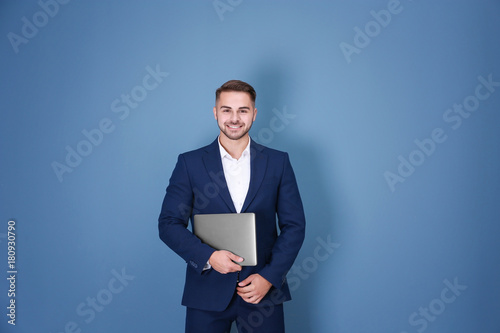 Young man with laptop again...