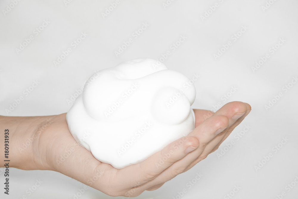 foam on hand isolated on white background