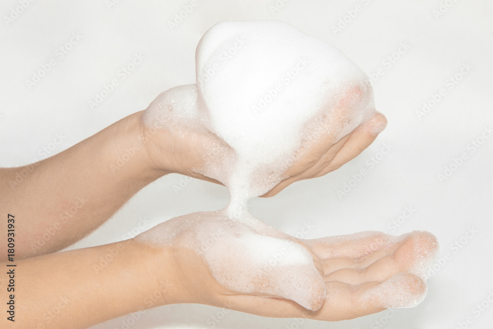 Fototapeta premium foam on hand isolated on white background