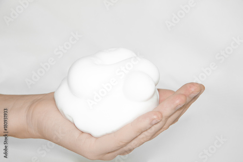 foam on hand isolated on white background