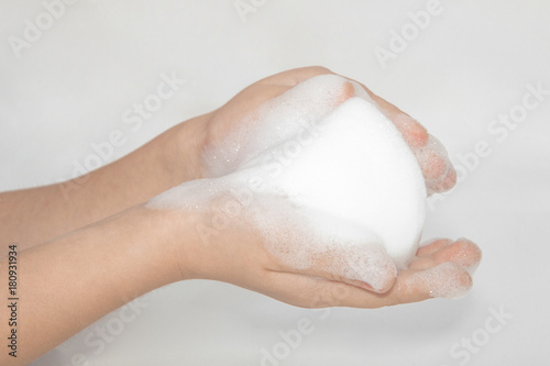 foam on hand isolated on white background