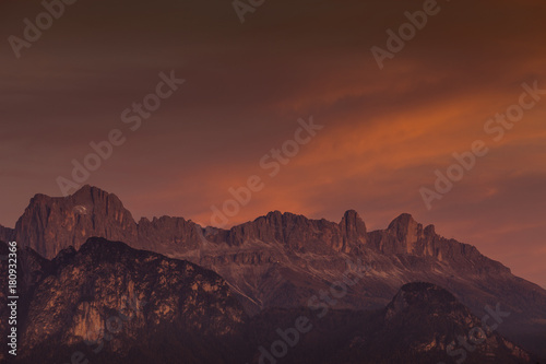 Amazing colorful clouds during autumnal sunset over Catinaccio/Rosengarten summit, Alto Adige/South Tyrol, Italy © Gianluca