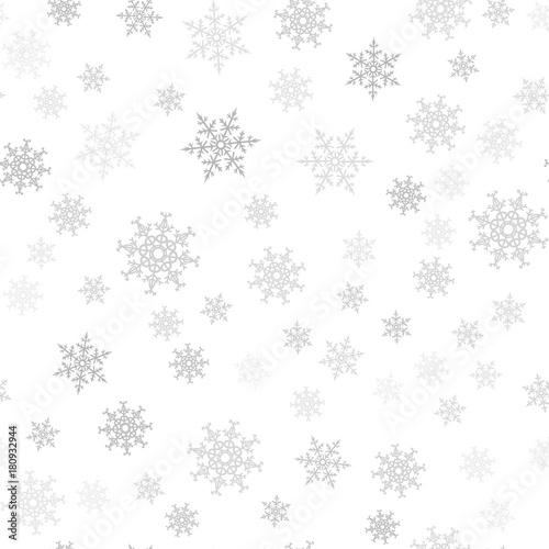 Seamless pattern. Christmas abstract background made of snowflakes on white. Design postcards, posters, greeting for the new year.