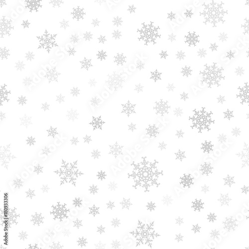 Seamless pattern. Christmas abstract background made of snowflakes on white. Design postcards, posters, greeting for the new year.
