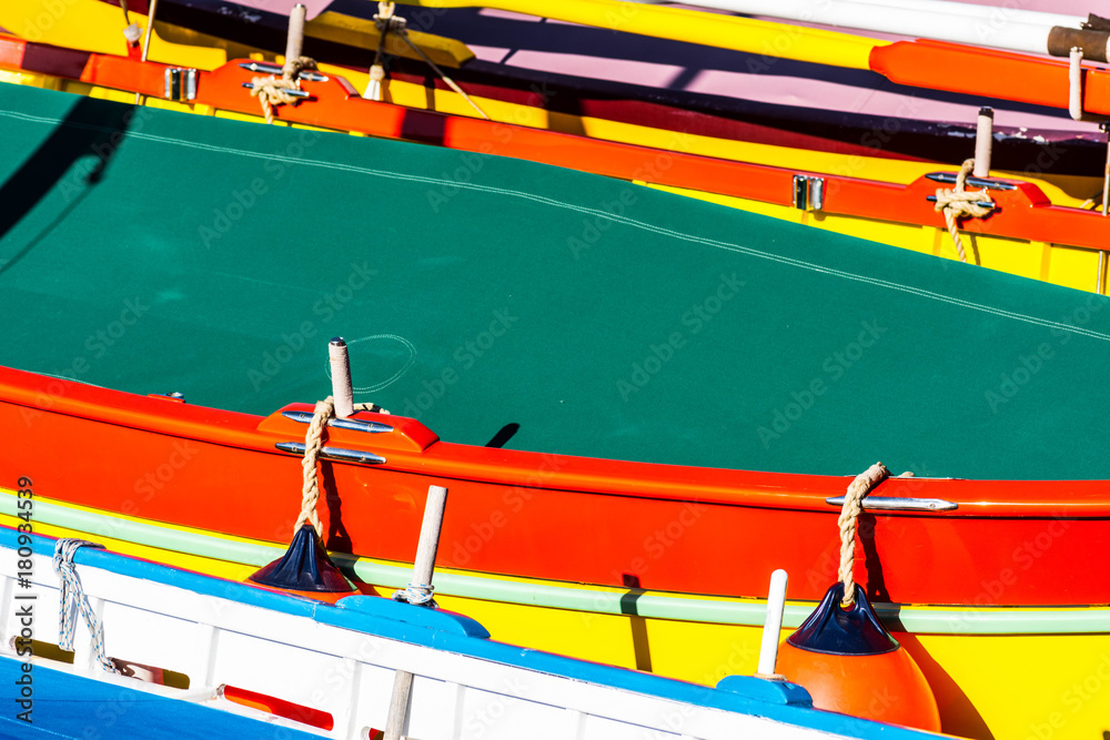 multicolored boats in seaport