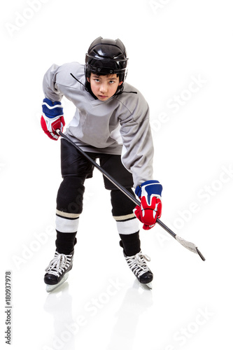 Junior Ice Hockey Player Isolated on White Background