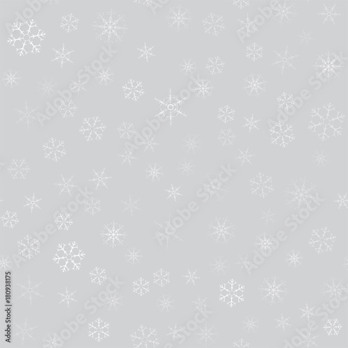 abstract seamless pattern of snowflakes. Christmas background for design of posters, postcards, invitation for the new year.