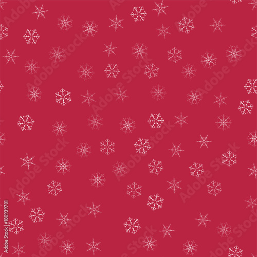 abstract seamless pattern Christmas background of snowflakes on a red. For design of cards  invitations  greeting for the new year.