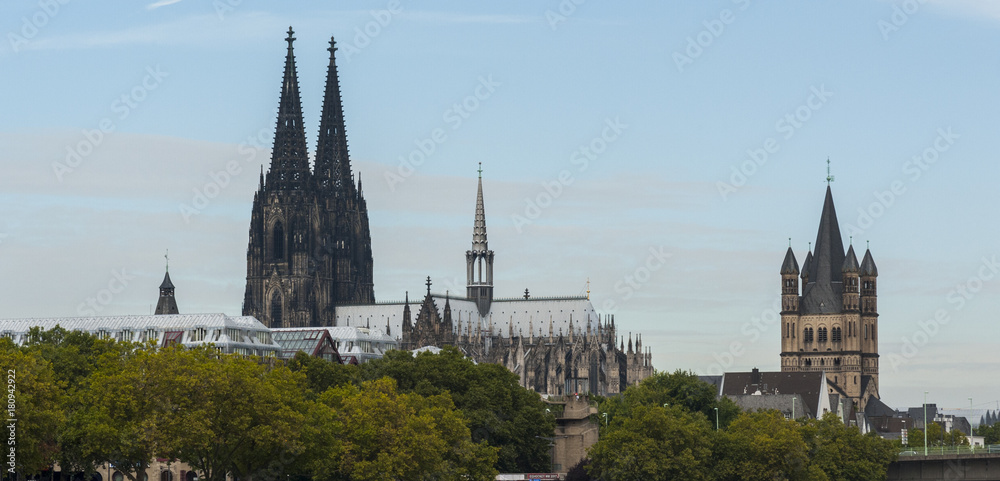COLOGNE, ITALY - SEPTEMBER 11, 2016: The view of the Roman Catholic Gothic Cathedral Kolner Dom, World Heritage - North Rhine Westphalia region, Cologne - Germany COLOGNE, ITALY - SEPTEMBER 11, 2016: The view of the Roman Catholic Gothic Cathedral Kolner Dom, World Heritage - North Rhine Westphalia region, Cologne - Germany