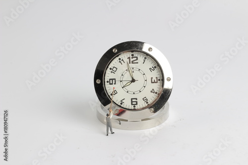 Canvas Print mini  people figure standing on clearing clock