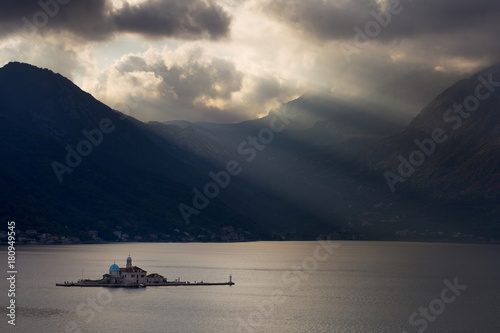 Small isand with church in Perast. Beautiful sky. Montenegro photo