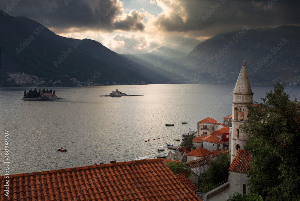 Fototapeta premium Amazing views of old town with church and house. Beautiful sky. Perast to Montenegro
