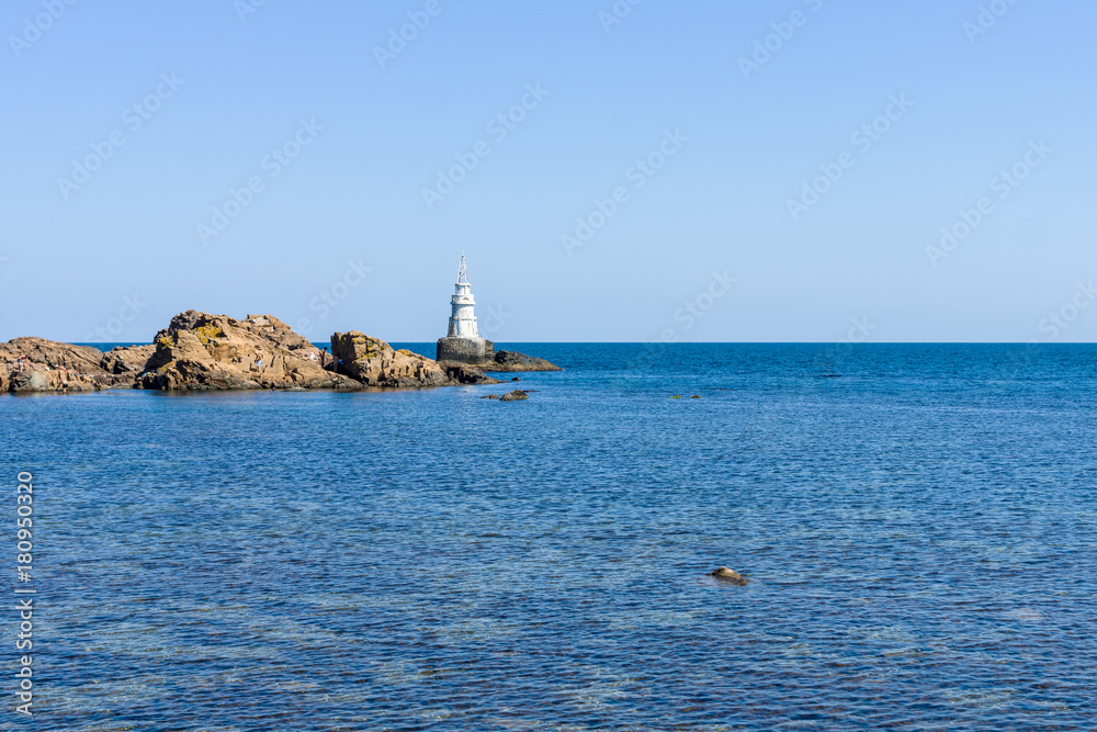 A lighthouse on the rocks. Black Sea. Ahtopol. Bulgaria. A lighthouse on the rocks. Black Sea. Ahtopol. Bulgaria.