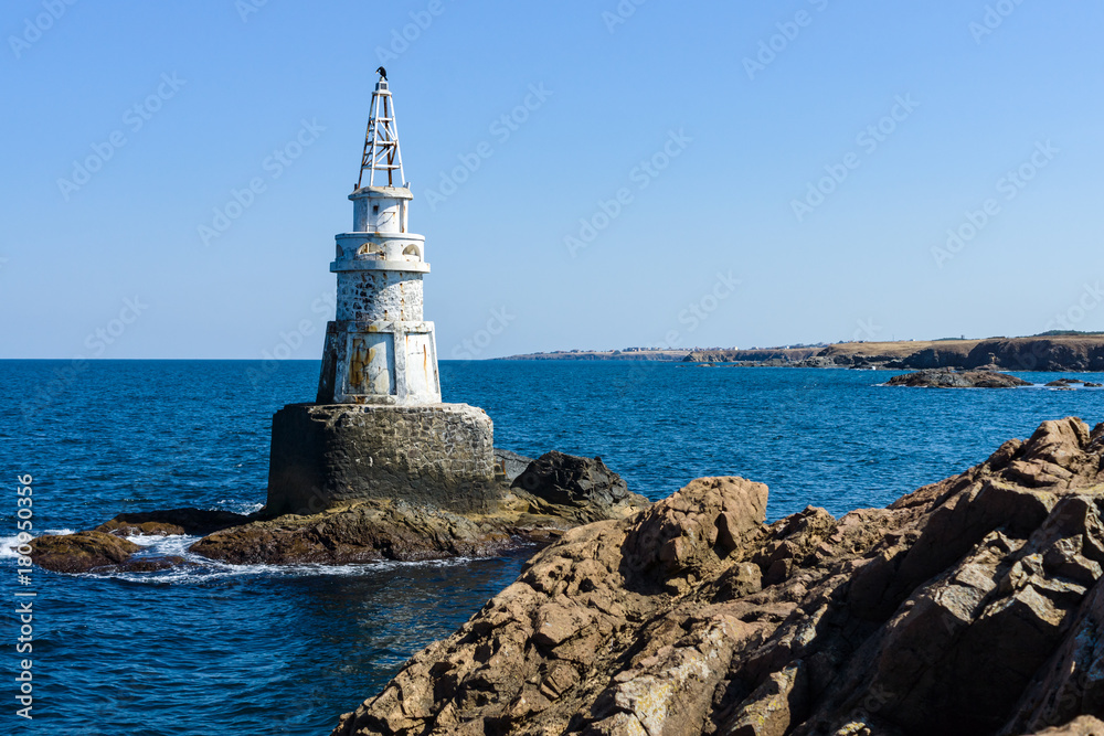 A lighthouse on the rocks. Black Sea. Ahtopol. Bulgaria.