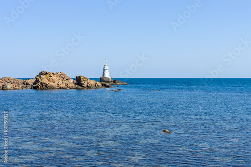 A lighthouse on the rocks. Black Sea. Ahtopol. Bulgaria. photo