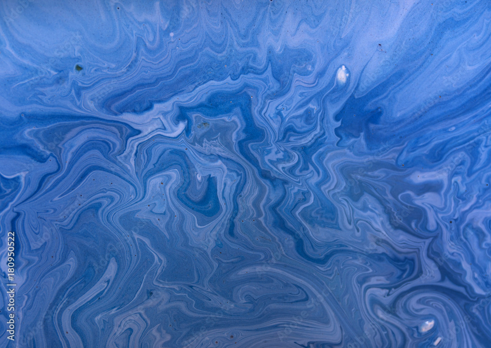 Marbled blue abstract background with golden sequins. Liquid marble ink pattern. Marbled blue abstract background with golden sequins. Liquid marble ink pattern.