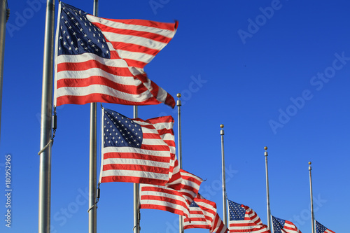 usa flag waving in the blue sky