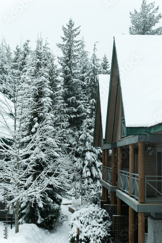 Ski lodge covered in snow in Whistler, Canada photo