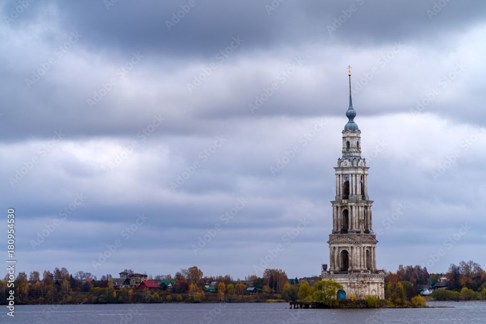 Kalyazin flooded bell tower on a cloudy day. Volga river in Russia. Kalyazin flooded bell tower on a cloudy day. Volga river in Russia.