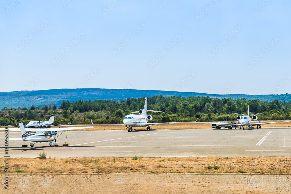Passenger planes at the airport Tivat, Montenegro. Passenger planes at the airport Tivat, Montenegro.