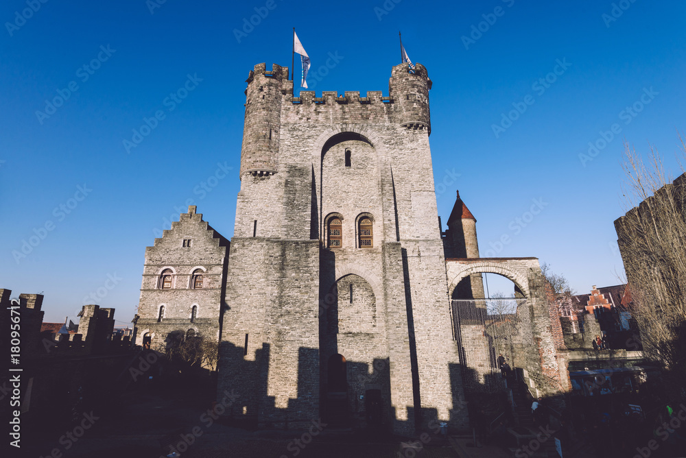 Ghent, Flanders, Belgium - December 30th, 2016. Gravensteen - historical medieval castle in flemish capital Gent. Castle of Counts stronghold by golde hour.