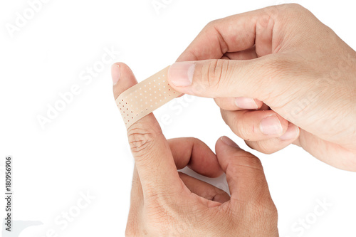 Bandage on the index finger isolate background