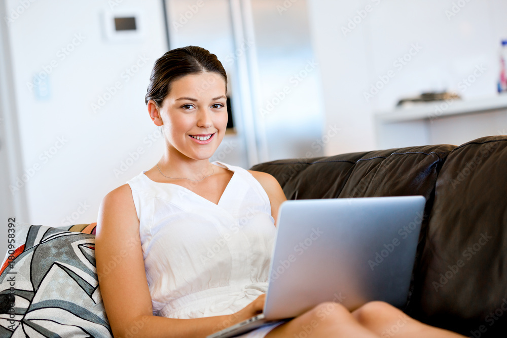 Young beautiful woman working on her laptop Young beautiful woman working on her laptop