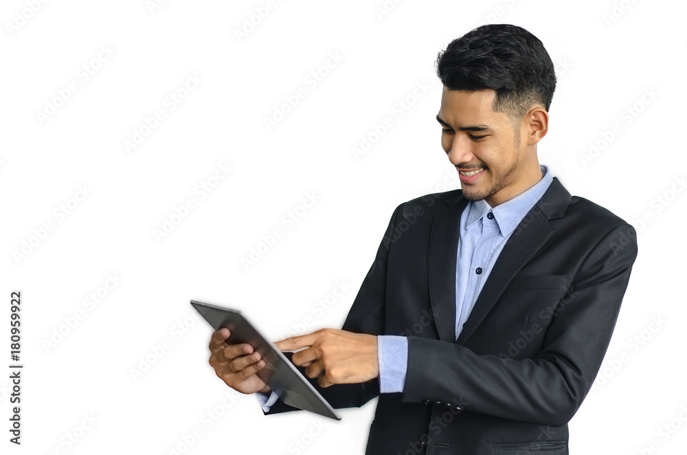 Handsome young asian businessman with tablet communicating isolated on white background Handsome young asian businessman with tablet communicating isolated on white background