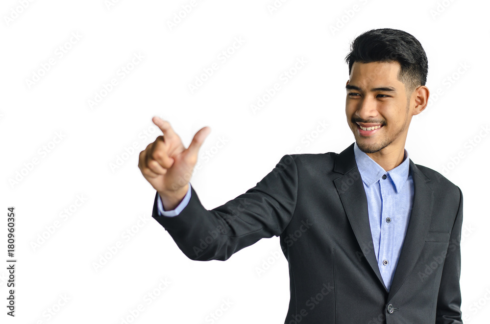 Young business man pointing at something interesting on a white background Young business man pointing at something interesting on a white background