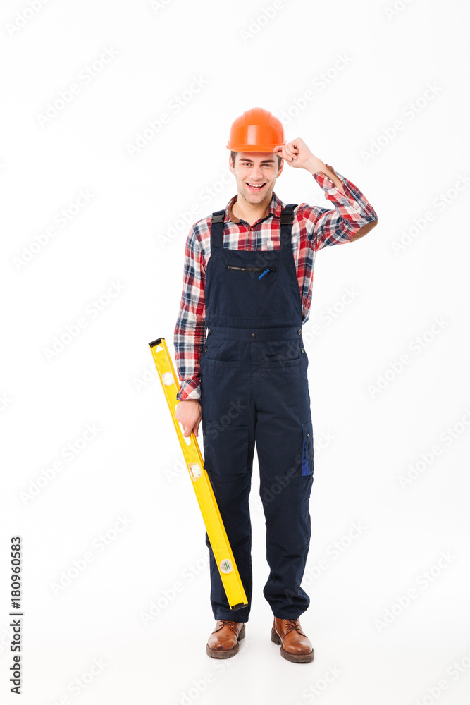 Full length portrait of a handsome young male builder Full length portrait of a handsome young male builder