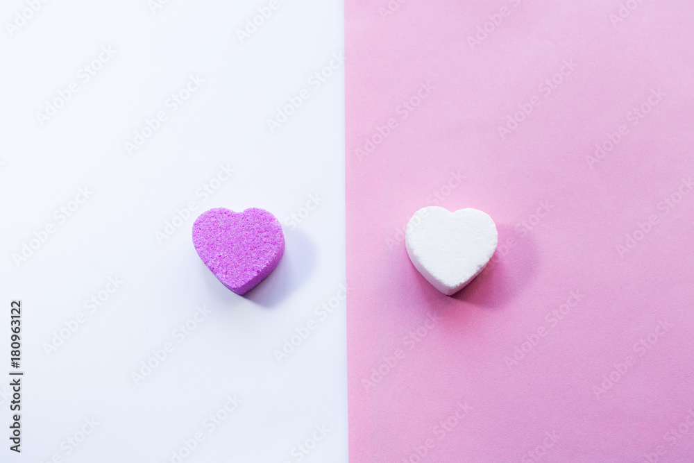 White and pirple candies in shape of heart